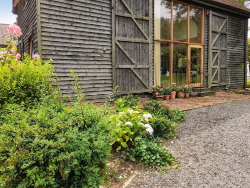 Un jardín fuera de Chilsham Barn