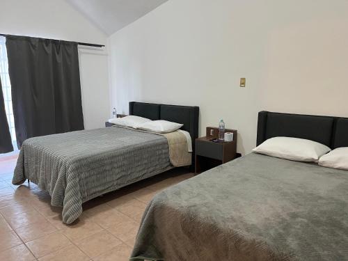 Ένα ή περισσότερα κρεβάτια σε δωμάτιο στο Venator House Habitación doble #23