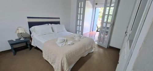 Un pat sau paturi într-o cameră la Casa Micha - Hospedaje temporal en Asunción