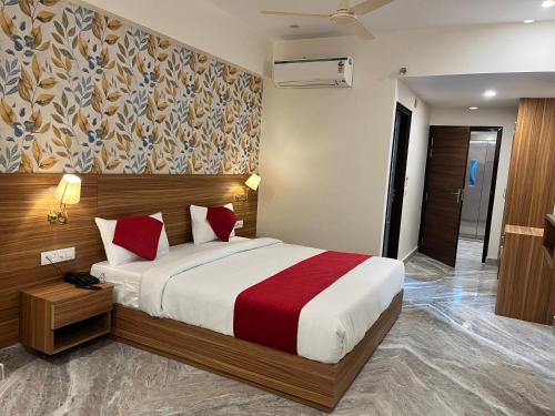 Postel nebo postele na pokoji v ubytování TrimHotel Grandview Jaipur