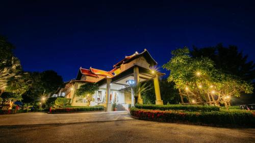 a building at night with lights in front of it at Luang Prabang View Hotel in Luang Prabang