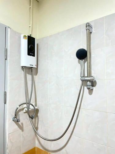 a shower in a bathroom with a shower at S-room Scentral Hatyai in Hat Yai