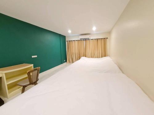 Postel nebo postele na pokoji v ubytování S-room Scentral Hatyai
