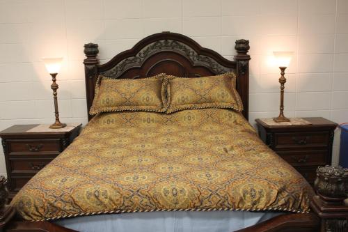 En eller flere senge i et værelse på Le Vignoble de l'École