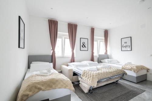 Katil atau katil-katil dalam bilik di Spacious 2 - Room Apartment - 6 Guests, 24h Check-in, Near Vienna