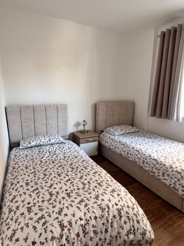 Postel nebo postele na pokoji v ubytování Cozy apartment