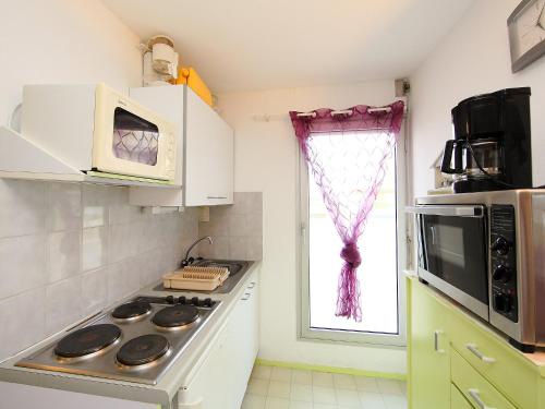 Apartment Ipanema Sud.4にあるキッチンまたは簡易キッチン