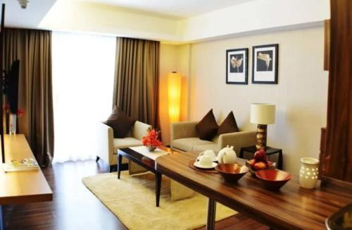 Χώρος καθιστικού στο Hotel Pacific Suites Near IGI Airport Delhi