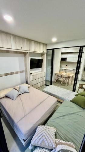 Una cama o camas en una habitación de Samaia Loft