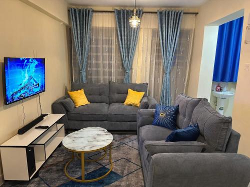 Posezení v ubytování Gee homes kamakis