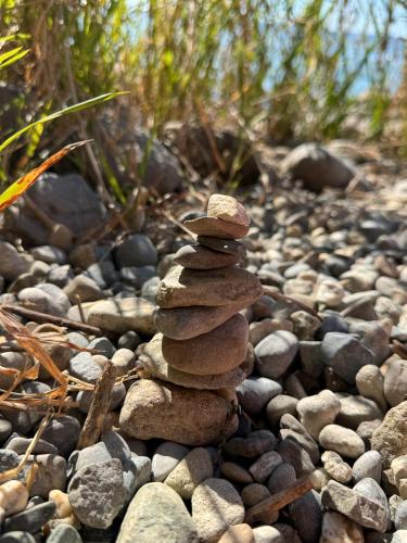 a stack of rocks sitting on a gravel road at Ferienwohnung Baier in Überlingen