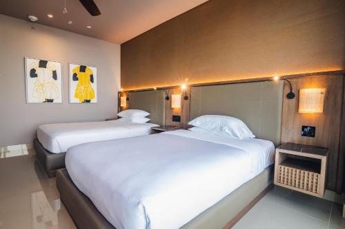 Un ou plusieurs lits dans un hébergement de l'établissement Hyatt Regency Cartagena