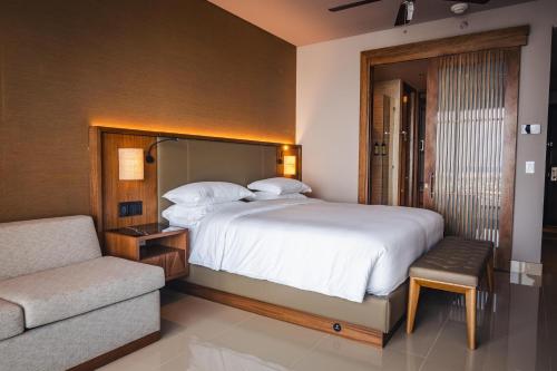 Un ou plusieurs lits dans un hébergement de l'établissement Hyatt Regency Cartagena
