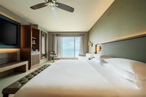 Un ou plusieurs lits dans un hébergement de l'établissement Hyatt Regency Cartagena