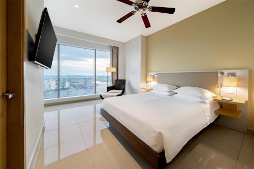 Un ou plusieurs lits dans un hébergement de l'établissement Hyatt Regency Cartagena