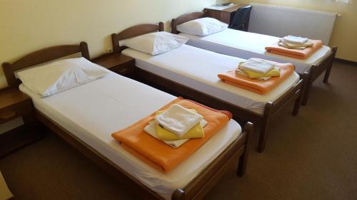 Postel nebo postele na pokoji v ubytování Hostel Kristal