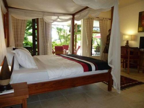Ένα ή περισσότερα κρεβάτια σε δωμάτιο στο 3 bedroom villa