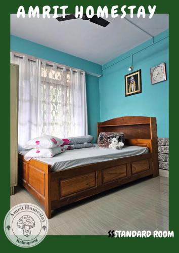 Postel nebo postele na pokoji v ubytování Amrit Homestay
