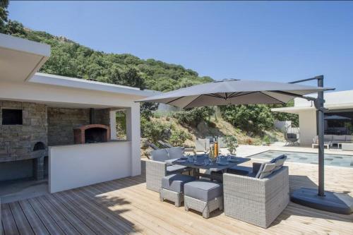 En terrasse eller udendørsområde på Villa Mizar