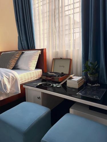 Postel nebo postele na pokoji v ubytování Mây Trắng Homestay