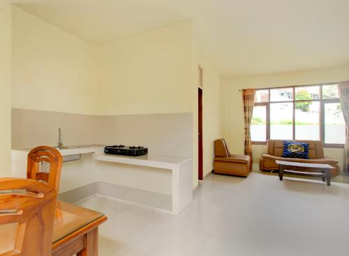 Φωτογραφία από το άλμπουμ του OYO 94582 Villa Beringin Puncak σε Μπογκόρ