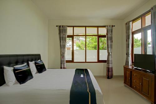 Fotografie z fotogalerie ubytování OYO 94582 Villa Beringin Puncak v destinaci Bogor