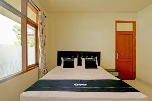 Fotografie z fotogalerie ubytování OYO 94582 Villa Beringin Puncak v destinaci Bogor