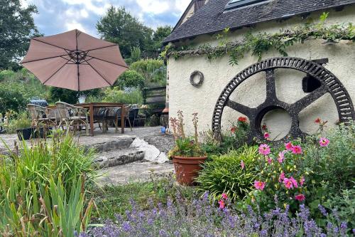 Zahrada ubytování Le Moulin de Pouzoult
