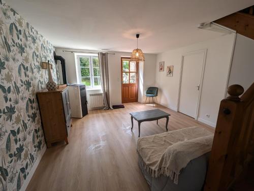 Postel nebo postele na pokoji v ubytování Gîte 8 personnes cadre authentique proche château du loir
