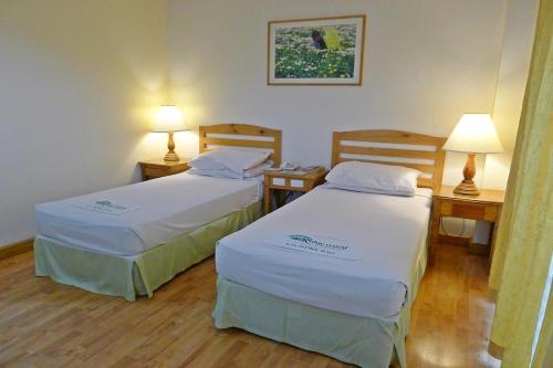 Cama o camas de una habitación en Ridgewood Hotel Baguio near The Mansion