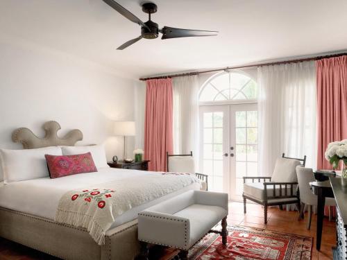 a bedroom with a bed and a ceiling fan at Casa Faena Miami Beach in Miami Beach