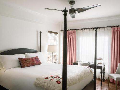 a bedroom with a bed and a ceiling fan at Casa Faena Miami Beach in Miami Beach