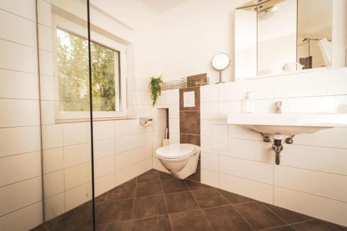 Ένα μπάνιο στο Gemütliches Ferienhaus auf Gut Johannesberg