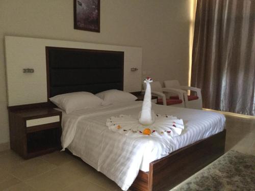 Postel nebo postele na pokoji v ubytování Jewel Inn Beni Suef