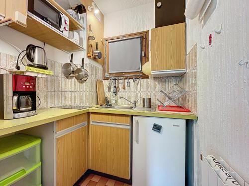Cuina o zona de cuina de Le Sciurus - Studio avec terrasse - Parking