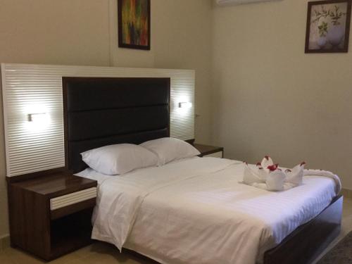 Postel nebo postele na pokoji v ubytování Jewel Inn Beni Suef