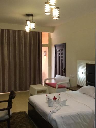 Postel nebo postele na pokoji v ubytování Jewel Inn Beni Suef