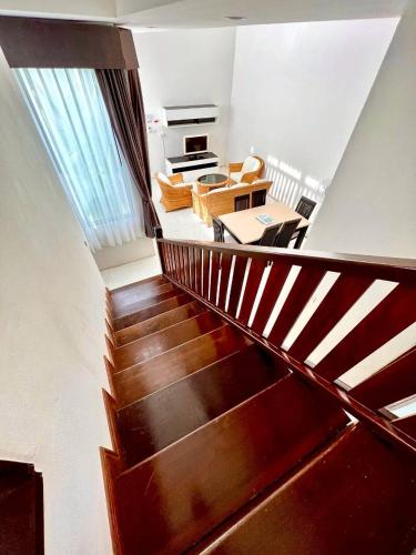 a view of a staircase with a living room at Baancivilize Resort in Khanom