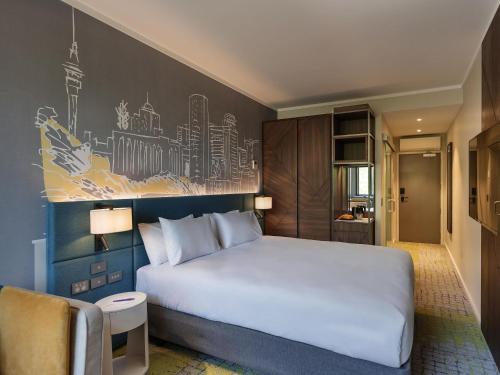 Letto o letti in una camera di Mercure Auckland Queen Street