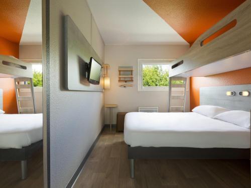 Katil atau katil-katil dalam bilik di ibis budget Le Mans Universite