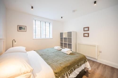Ένα ή περισσότερα κρεβάτια σε δωμάτιο στο 1 Leiston Court, Leiston