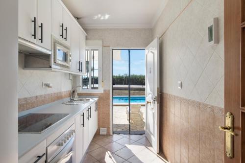 Kuchyň nebo kuchyňský kout v ubytování Chalet Independiete Con Piscina