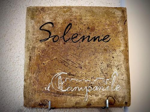 a book with the words sbenamine and a trumpet at Il Campanile Premium B&b in Altamura