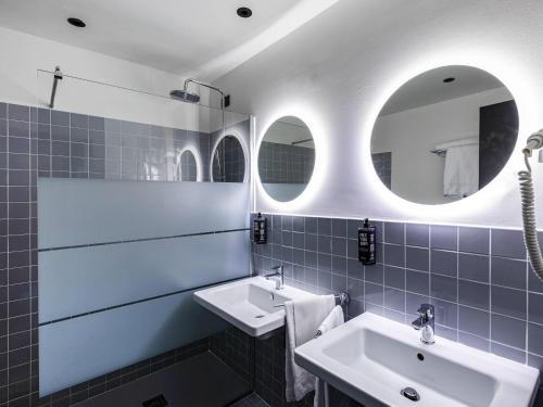 Un baño de Ibis Styles Roma Aurelia