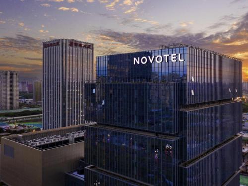 a nocet building with the word novisor on it at Novotel Xian Xixian in Xi'an