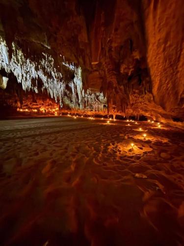 a view of the inside of a cave at night at Alwaha safari hotel in Qasr Al Farafirah