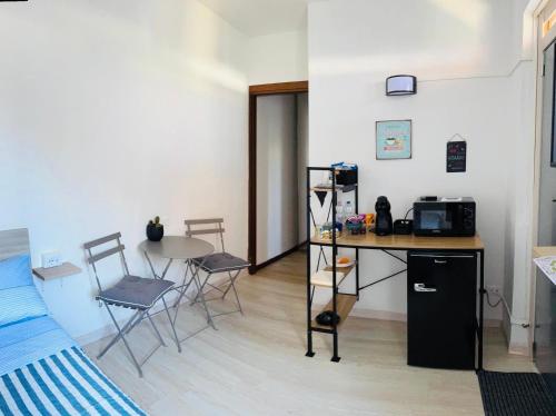 Kuchyň nebo kuchyňský kout v ubytování Hello Verona Rooms