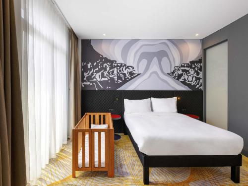 Cama o camas de una habitación en ibis Styles Istanbul Merter