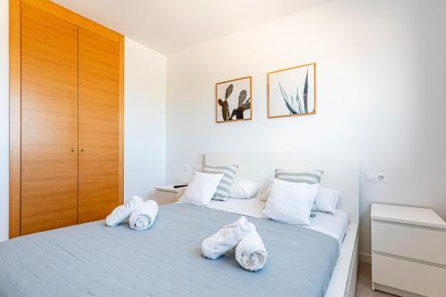 Ένα ή περισσότερα κρεβάτια σε δωμάτιο στο Beach House Playa del Puig