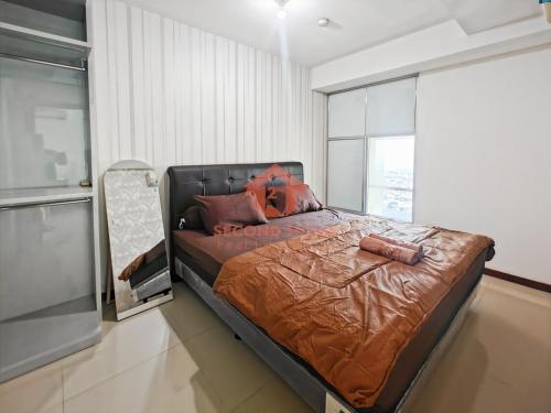 Ένα ή περισσότερα κρεβάτια σε δωμάτιο στο Best View 1BR Baywalk Condo Pool Gym, Wi-Fi